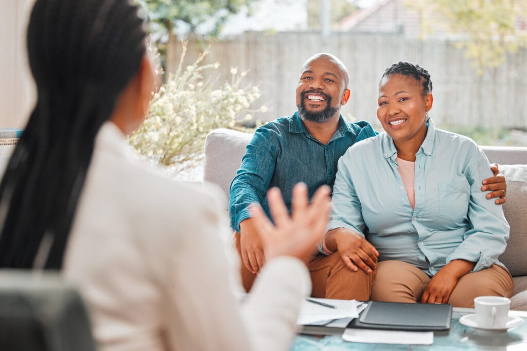 Shot of a mature couple meeting with their insurance agent